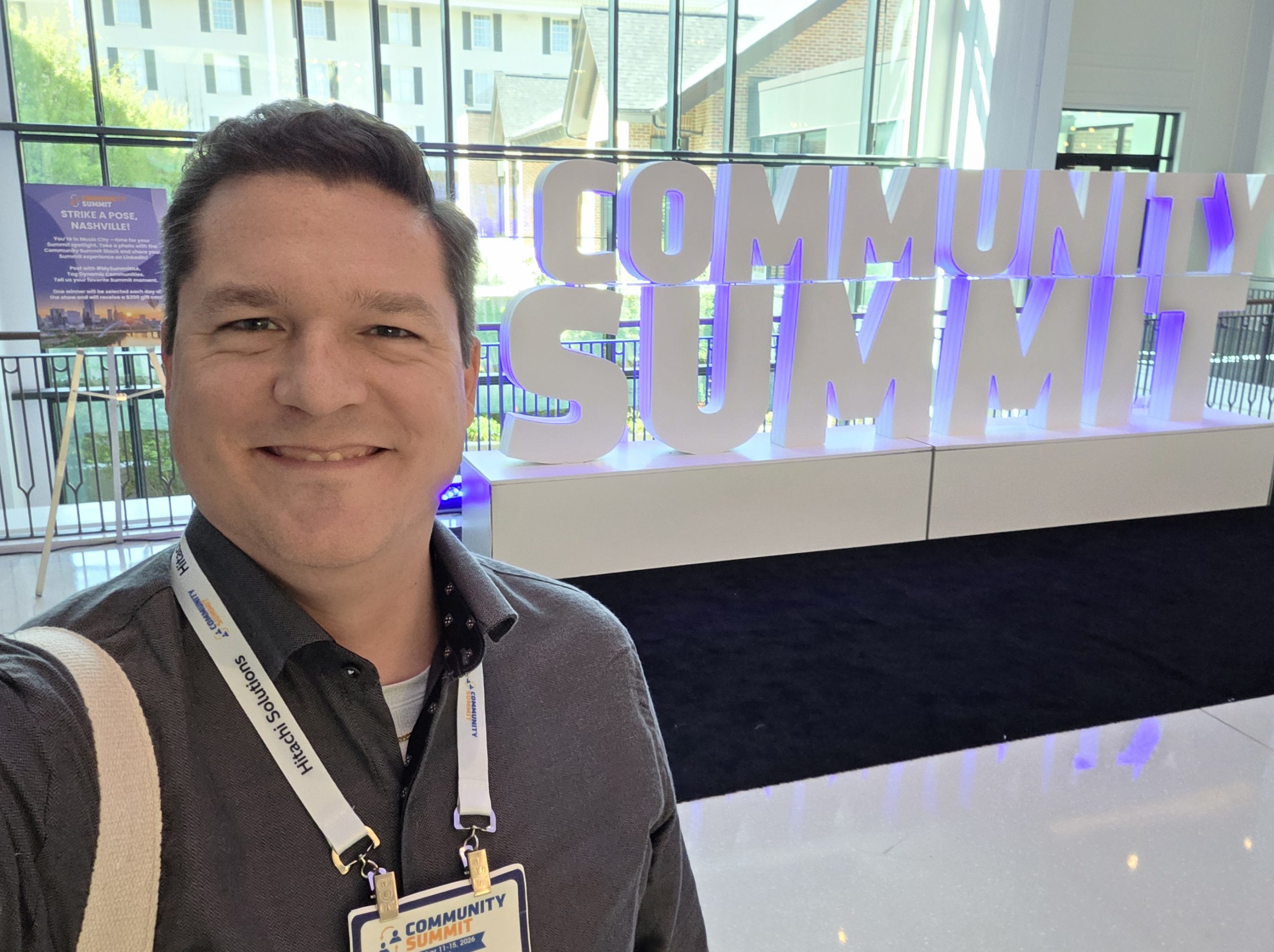 Community Summit sign selfie